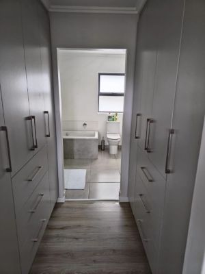 passage of walk in closets